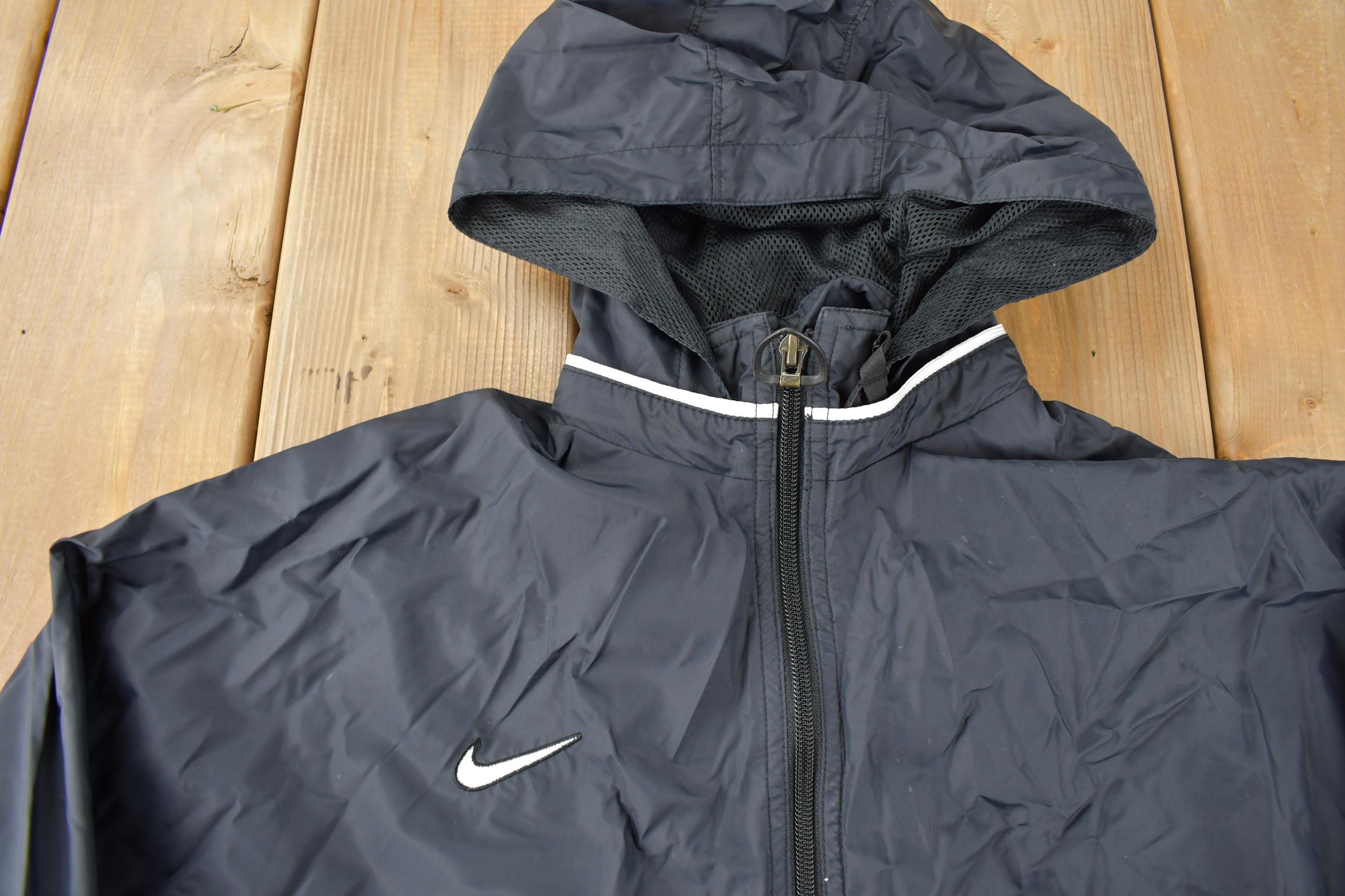 Vintage 1990s Black Nike Mini Swoosh Women's Windbreaker Jacket Size M