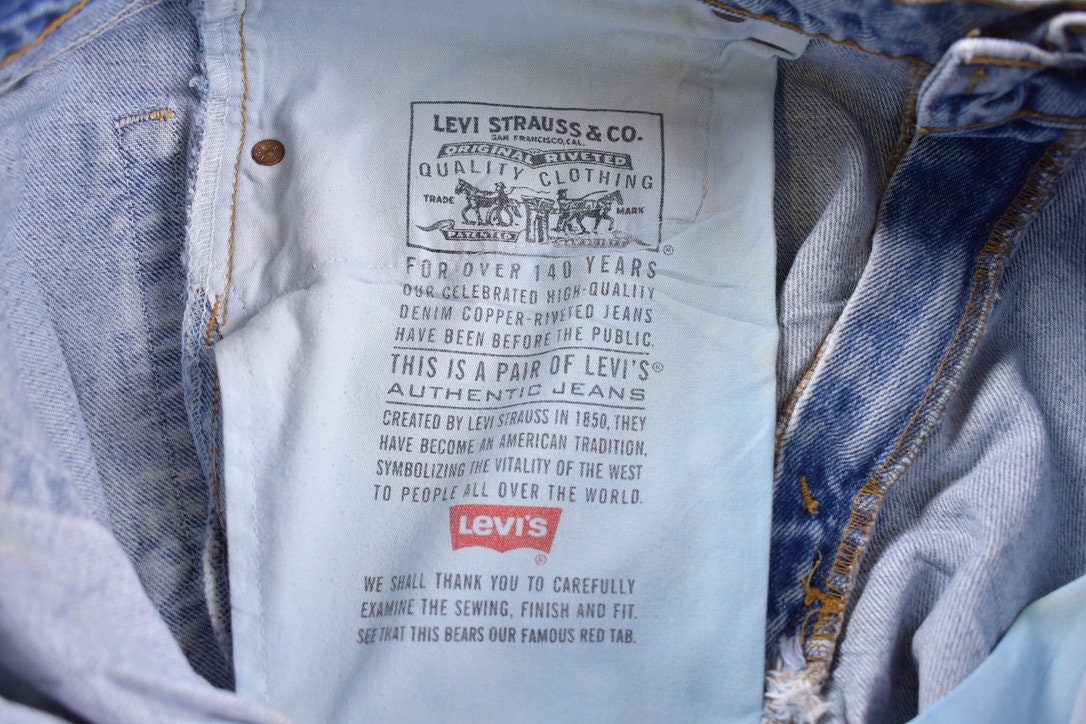 Vintage 1990s Levi 550s Red Tab Jeans Size 34 x 31