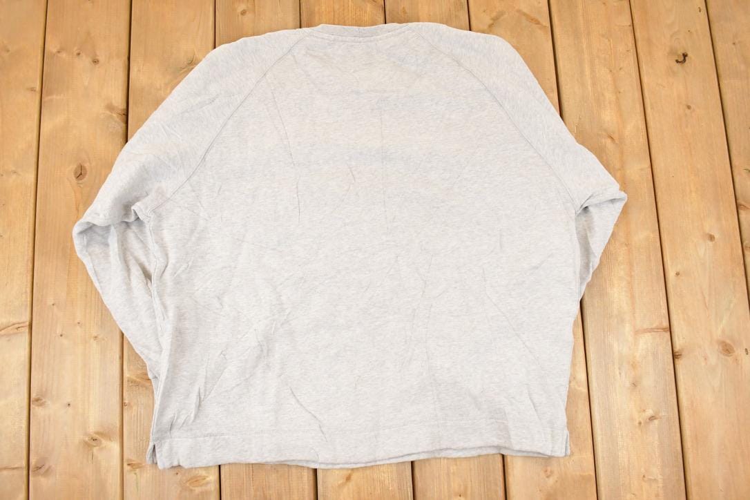 Vintage 1990s Eddie Bauer Sleeve Pocket Graphic Print V Neck Sweatshirt Mens XL