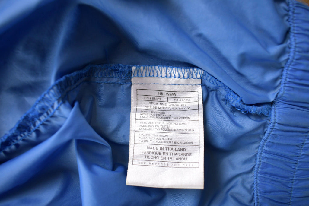 Vintage 1990s Nike Embroidered Mini Swoosh Windbreaker Jacket