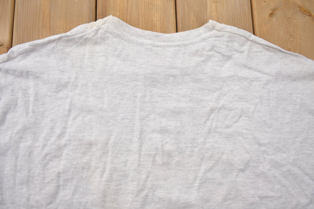 Vintage 1990s Looney Tunes Hockey Graphic T-Shirt