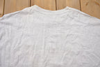 Vintage 1990s Looney Tunes Hockey Graphic T-Shirt