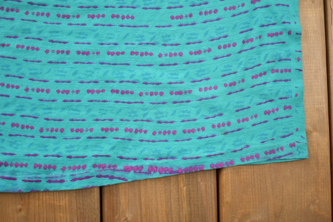 Vintage 1991 Ocean Pacific All Over Print Graphic T Shirt