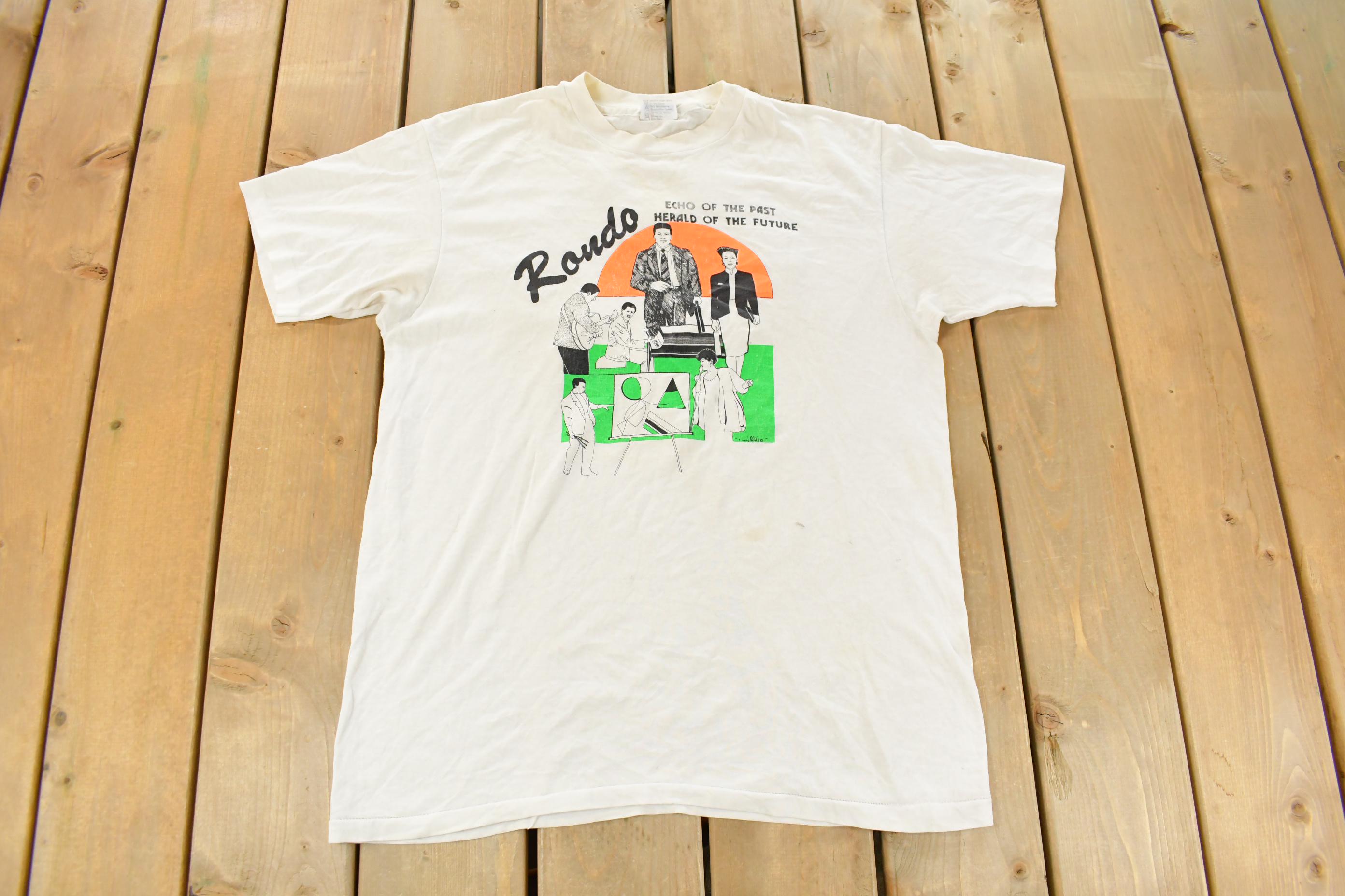 Vintage 1990s Burton Kramer's Rondo Art Music Graphic T Shirt Men's L