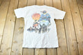 Vintage 1990s Jimmy Buffett's Caribbean Soul Tourist Penguin Souvenir Single Stitch Graphic T-Shirt