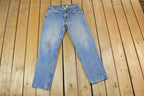 Vintage 1990s Levi Strauss Distressed Red Tab 550 Denim Jeans Size 33 x 32