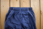 Vintage 1990s Nike Mini Swoosh Track Pants Size S