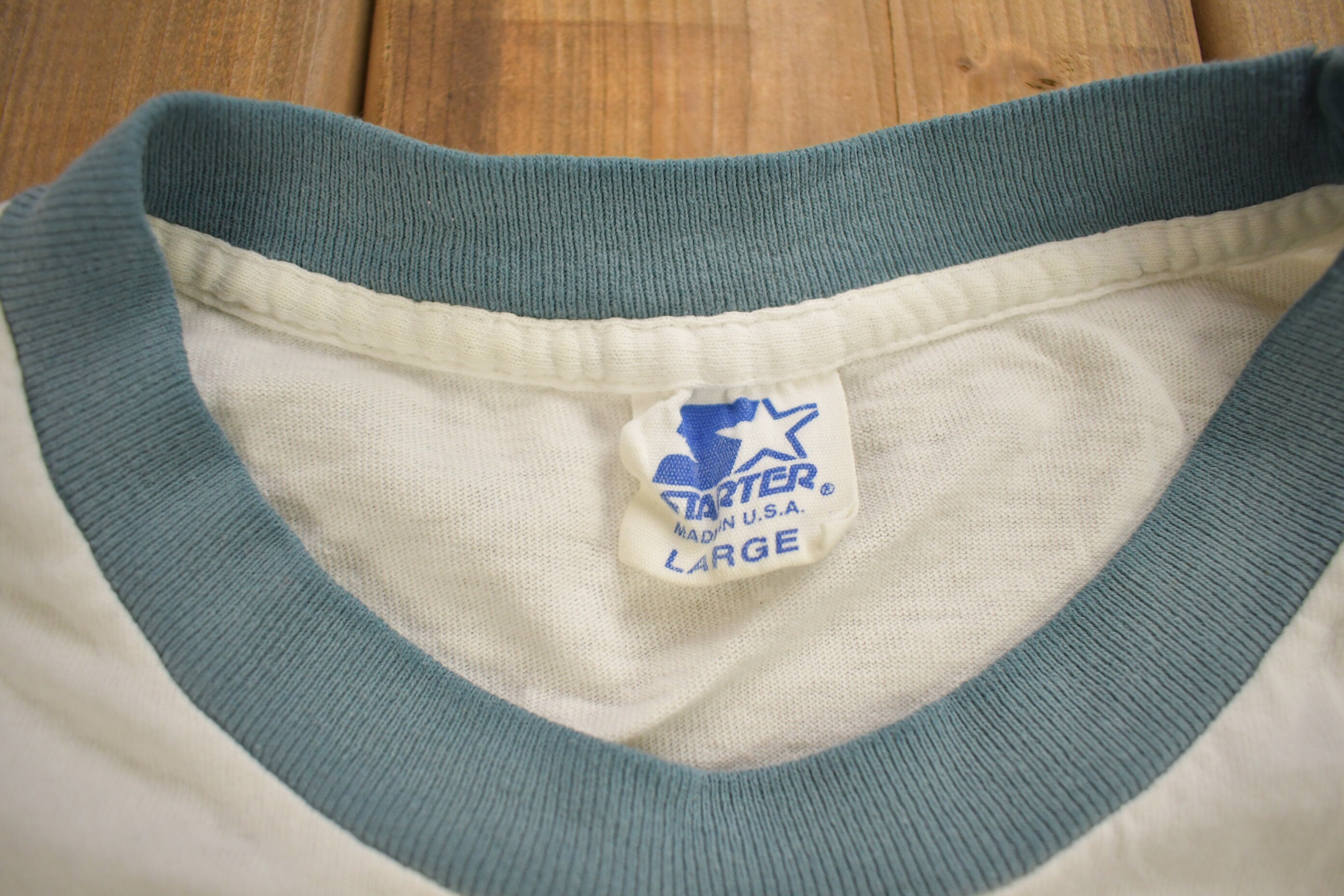 Vintage 1990s Starter Graphic Ringer T-Shirt