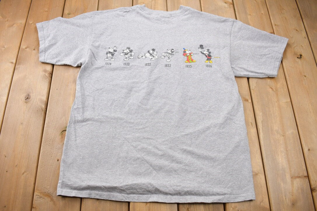 Vintage 2000s Walt Disney World Mickey Mouse Over the Years T-Shirt