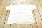Vintage 1990s Body Wrappers Blue Flower T-Shirt Mens XL