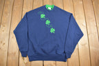 Vintage 1990s Whats Up Front Clover Embroidered Crewneck Sweatshirt