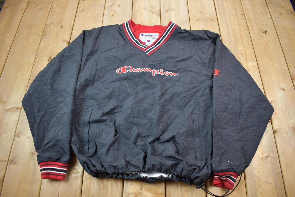 Vintage 1990s Champion Embroidered Spell Out Windbreaker