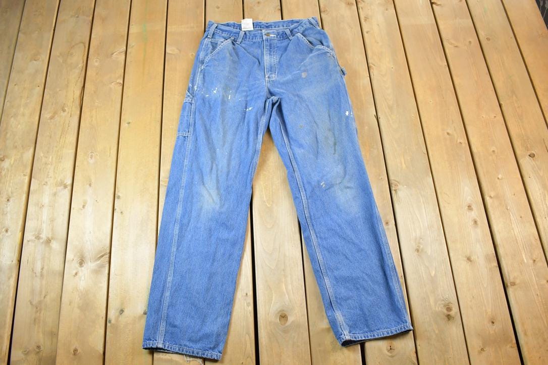Vintage 1990s Carhartt Loose Fit Denim Work Jeans Size 34 x 34