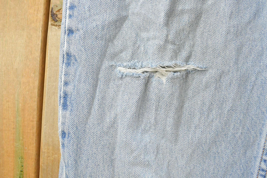 Vintage 1990s Levi's 560 Loose Tapered Denim Jeans Men's 26 x 31 / 90s Levi's / Distressed Sun Faded Jeans