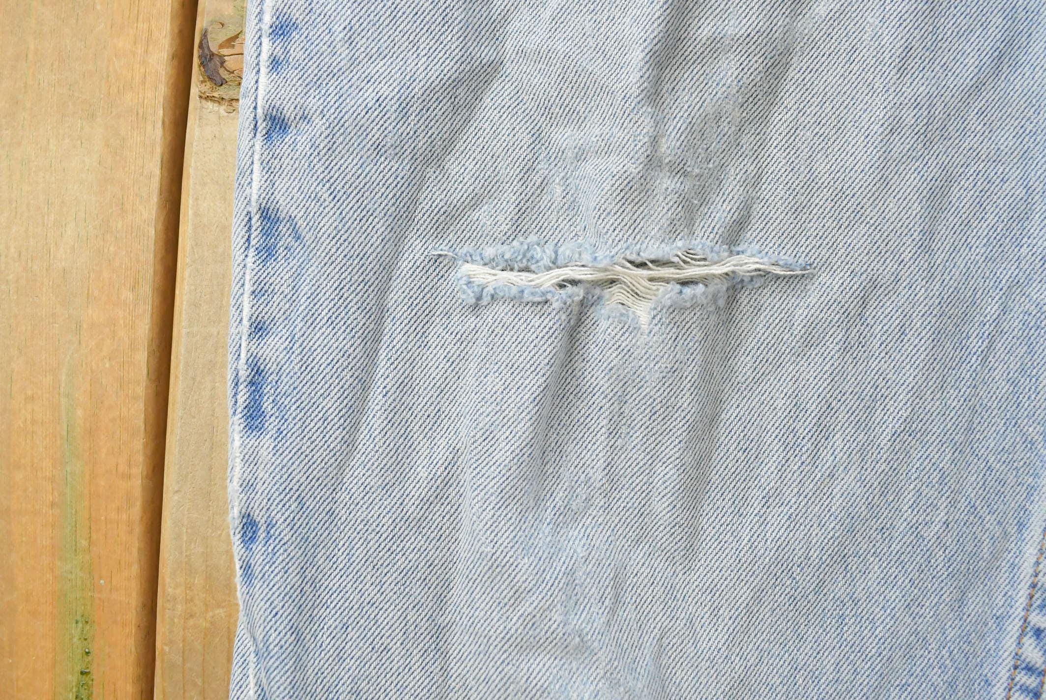 Vintage 1990s Levi's 560 Loose Tapered Denim Jeans Men's 26 x 31 / 90s Levi's / Distressed Sun Faded Jeans