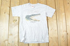 Vintage 1990s Bite Me Gatorama Souvenir T-Shirt Youth L