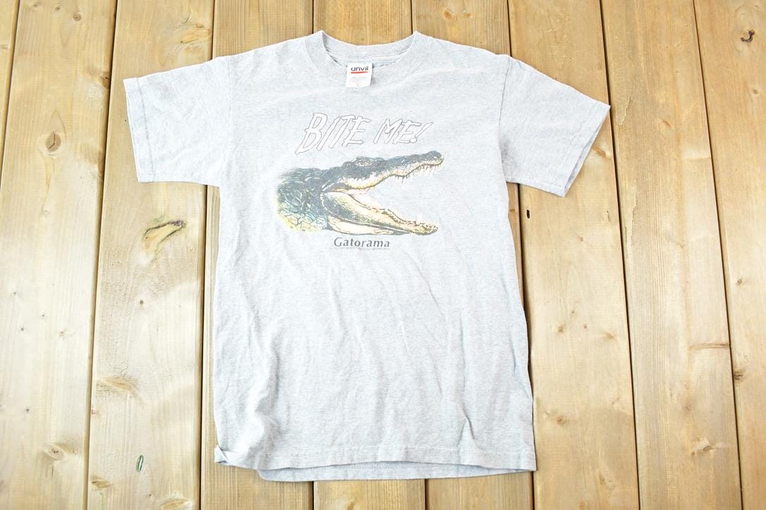 Vintage 1990s Bite Me Gatorama Souvenir T-Shirt Youth L