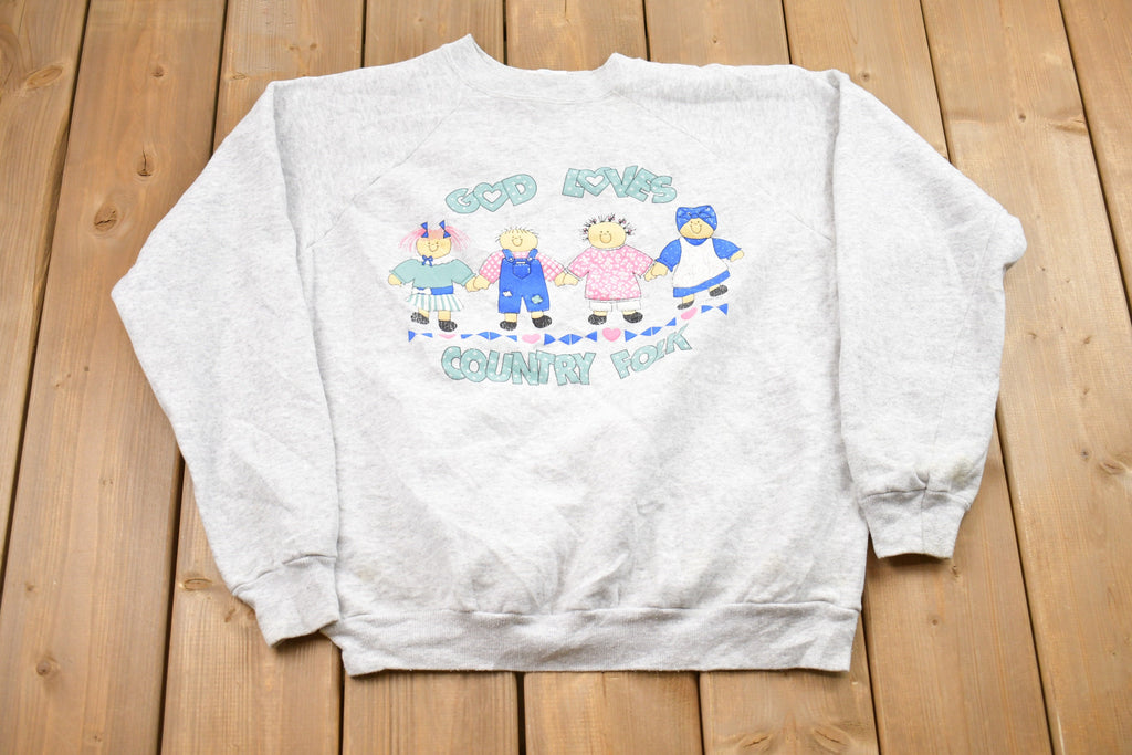 Vintage 1980s God Loves Country Folk Graphic Sweatshirt