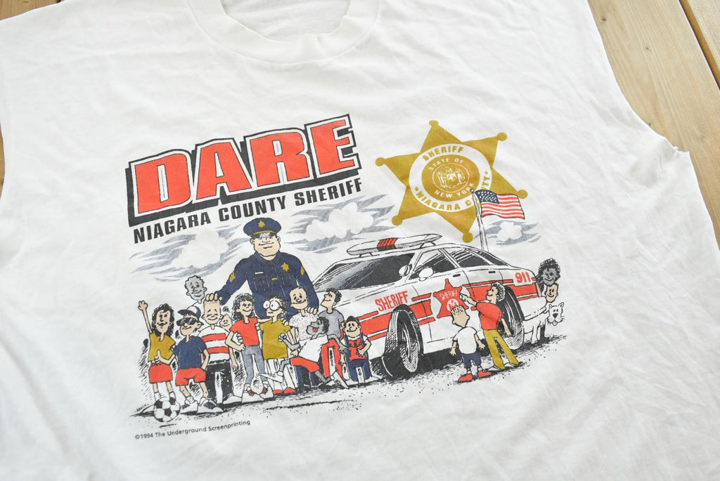 Vintage 1990s Dare to Resist Drugs And Violence Dare Niagara Sheriff Cutoff Tank Top T-Shirt Men's L