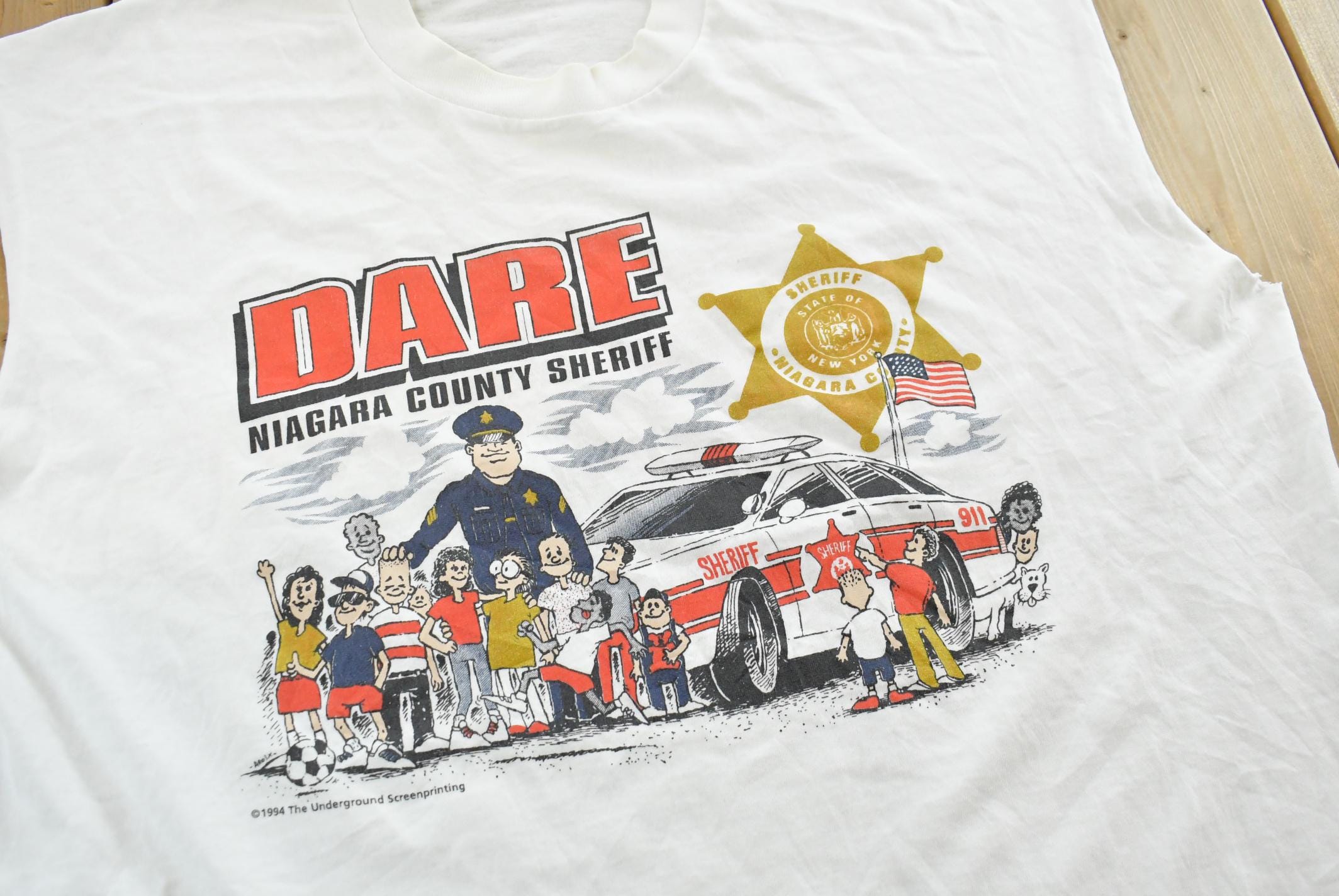 Vintage 1990s Dare to Resist Drugs And Violence Dare Niagara Sheriff Cutoff Tank Top T-Shirt Men's L