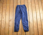 Vintage 1990s Nike Mini Swoosh Track Pants Size S