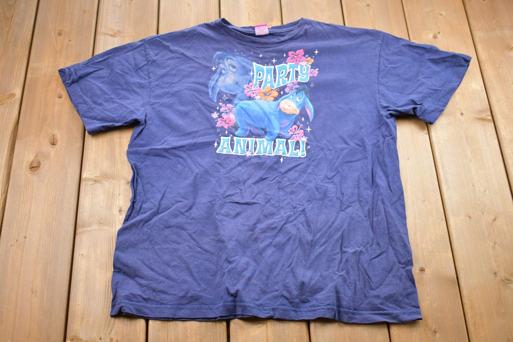 Vintage 1990s Disney Eeyore Party Animal Graphic T-Shirt  Graphic  80s  90s  Streetwear  Retro Style  Walt Disney World  90s Disney