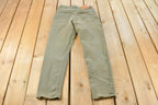 Vintage 1990s Levi's 512 Slim Tapered Denim Jeans Women's 28 x 29 / 90s Levi's / Distressed Sun Faded Jeans