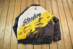 Vintage 1990s Pittsburgh Steelers NFL Pro Line Logo Athletic Paint Splash Puffer Jacket