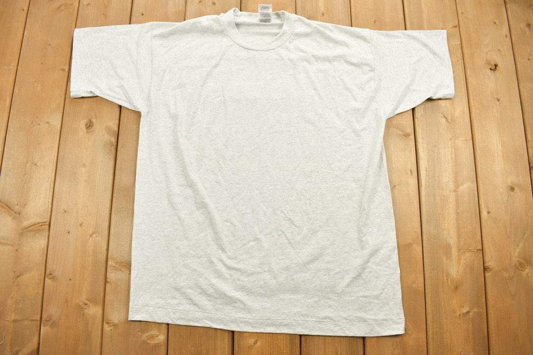 Vintage 1990s Ogilvy Renault Law Firm Graphic T-Shirt