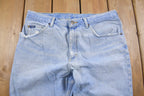 Vintage 1990's Lee Blue Light Wash Knee Distressing Jeans 32 x 32