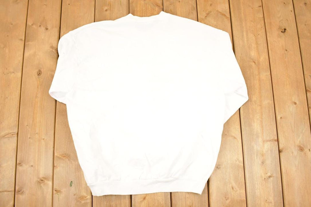 Vintage 1990s Delivering Christmas Cheer Graphic Print Santa Crewneck Sweatshirt Mens L