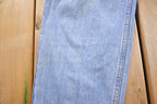 Vintage 1990s Levi's 550 Red Tab Jeans Size 34 x 33