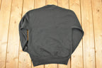 Vintage 1990s Russell Athletic Bauer Hockey Graphic Print Crewneck Sweatshirt Mens M