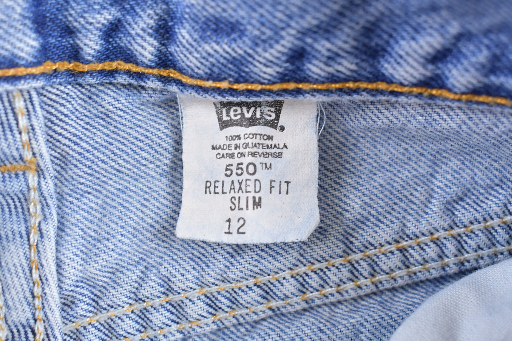 Vintage 1990s Levi's 550 Red Tab Denim Jeans Size 24 x 25