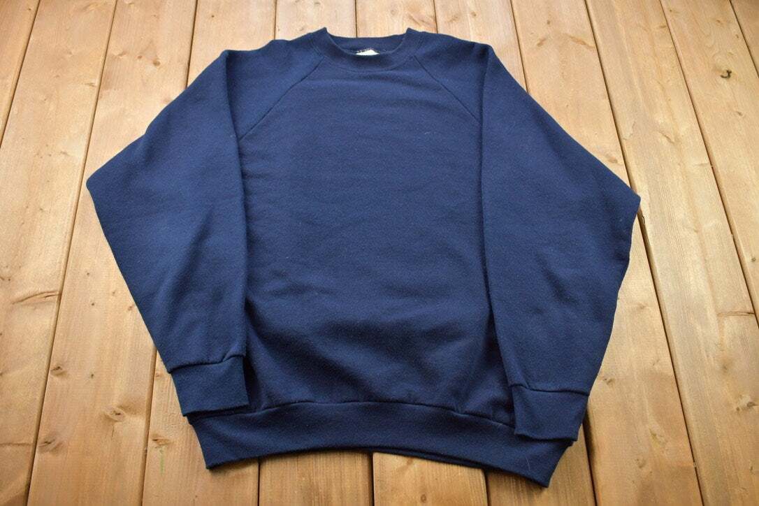 Vintage 1990s Fruit Of The Loom Blank Raglan Crewneck Sweatshirt