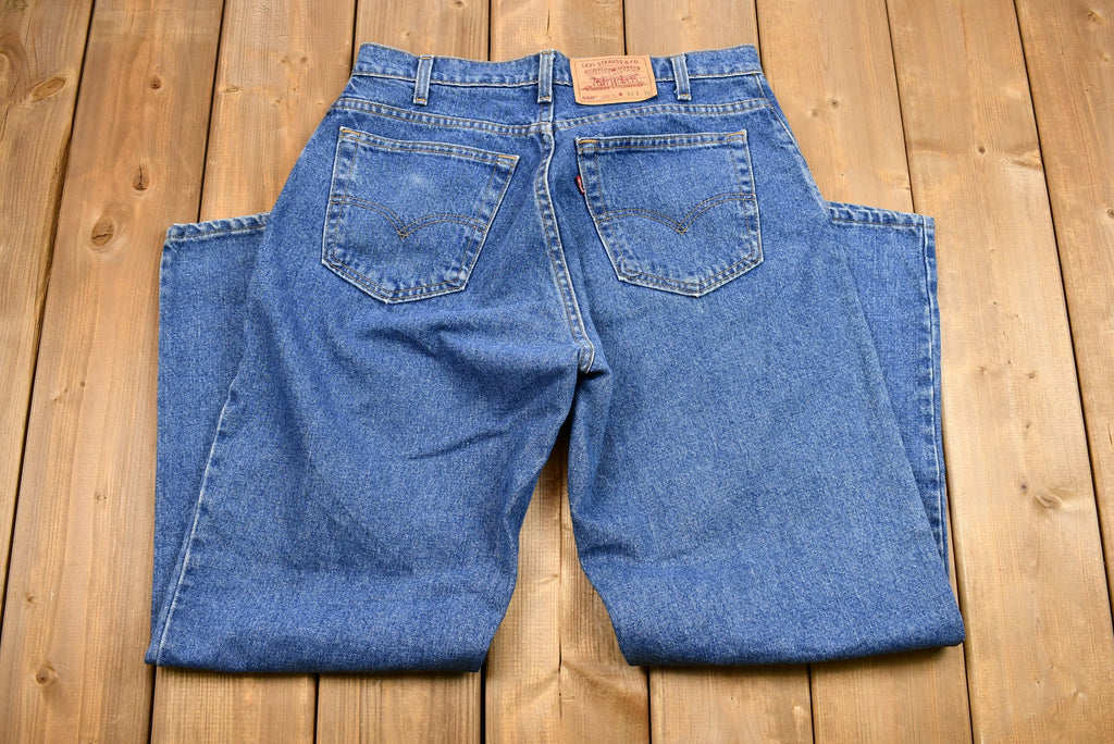 Vintage 1990s Levi's 560 Medium Wash Loose Fit Tapered Leg Mom Jeans
