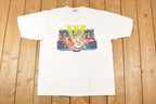 Vintage 1990s Santa Claus World Tour Souvenir Christmas T-Shirt Men's XL