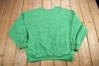 Vintage 1980s Taft Wildcats Pride Staff Raglan Crewneck Sweatshirt