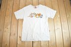 Vintage 1990s Winnie The Pooh And Friends Walt Disney World Graphic T-Shirt