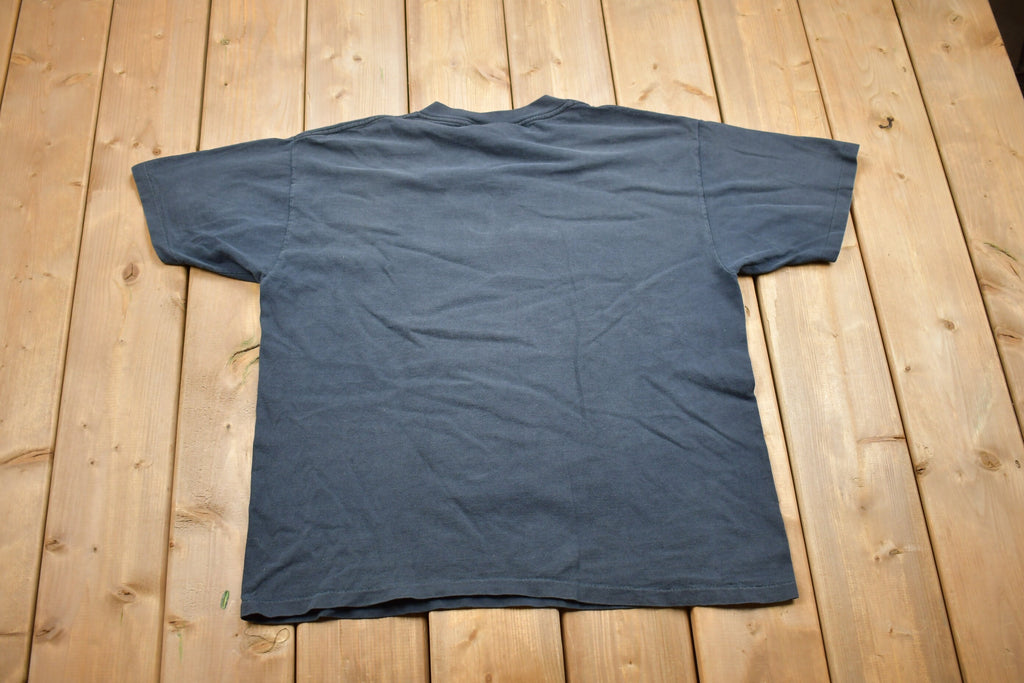 Vintage 1990s Reebok Graphic T Shirt