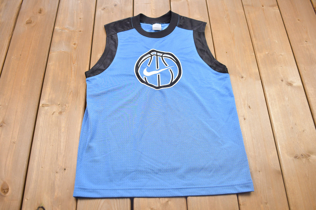 Vintage 1990s UNC Nike Basketball Graphic Youth Jersey