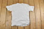 Vintage 1990s Youth Dinosaur Theme Graphic T-Shirt