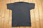 Vintage 1990s "Cant Torch This" Patriot Graphic T-Shirt