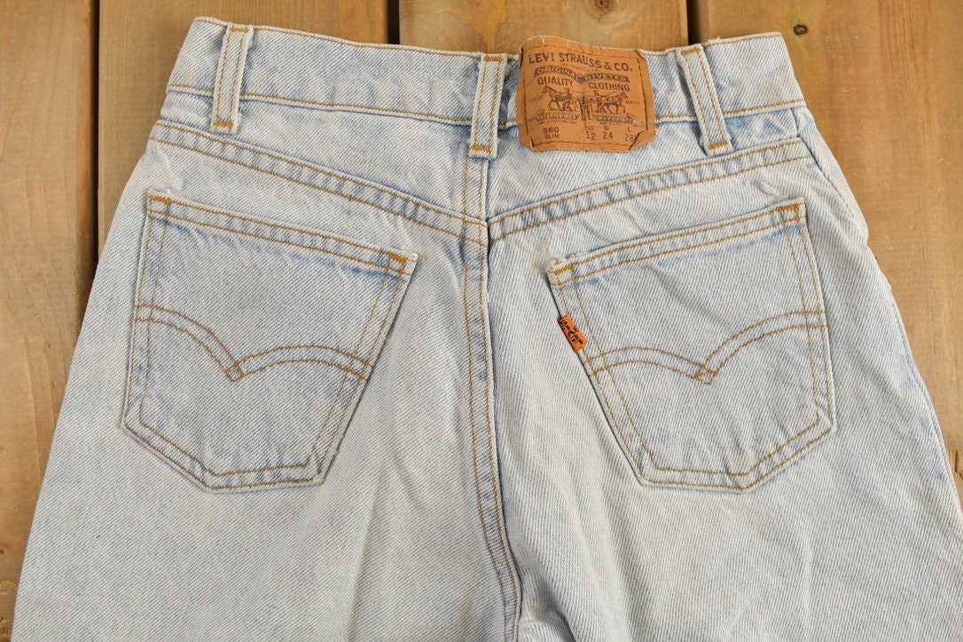 Vintage 1990s Levi's 560 Orange Tab Jeans Size 24 x 26