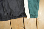 Vintage 1990s Nike Mini Swoosh Windbreaker Jacket Men's Medium
