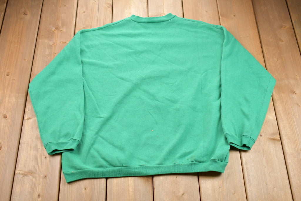 Vintage 1990s Official Christmas Kisser Graphic Crewneck Sweatshirt / 90s Crewneck / Souvenir / Athleisure /Holiday Sweatshirt / Made In USA