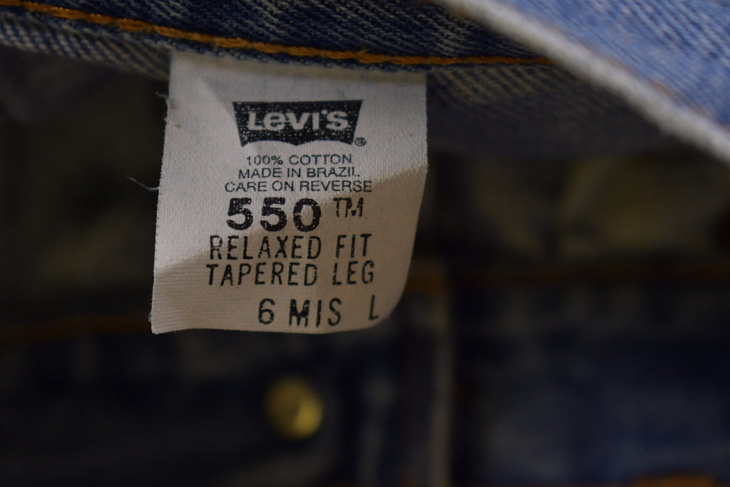 Vintage 1990s Levi's 550 Red Tab Jeans Size 26 x 33