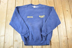 Vintage 1990s Quality Care Transportation Souvenir Crewneck Sweatshirt Made In USA