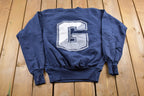Vintage 1990s University of Georgetown Bulldogs Graphic Collegiate Crewneck Made In USA NCAA Sweatshirt