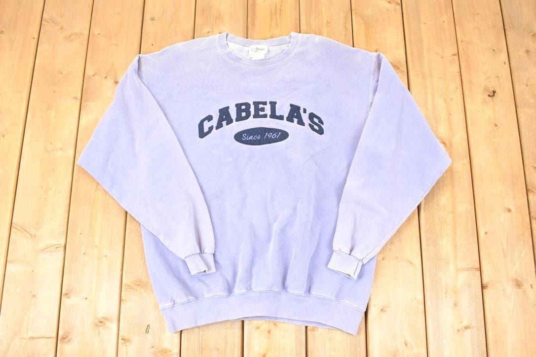 Vintage 1990s Artisans Cabela's Embroidered Text Logo Crewneck Sweatshirt Men's L / Made In USA / 90's Outdoorsman Destination Sweater